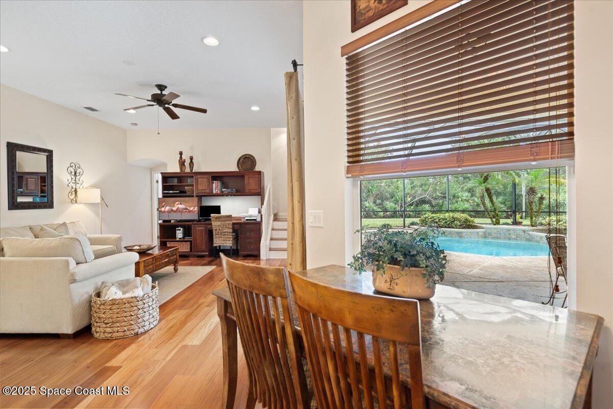 8167 Andover Way Melbourne, FL 32940 - Photo 16 of 78 a living room with furniture and a large window