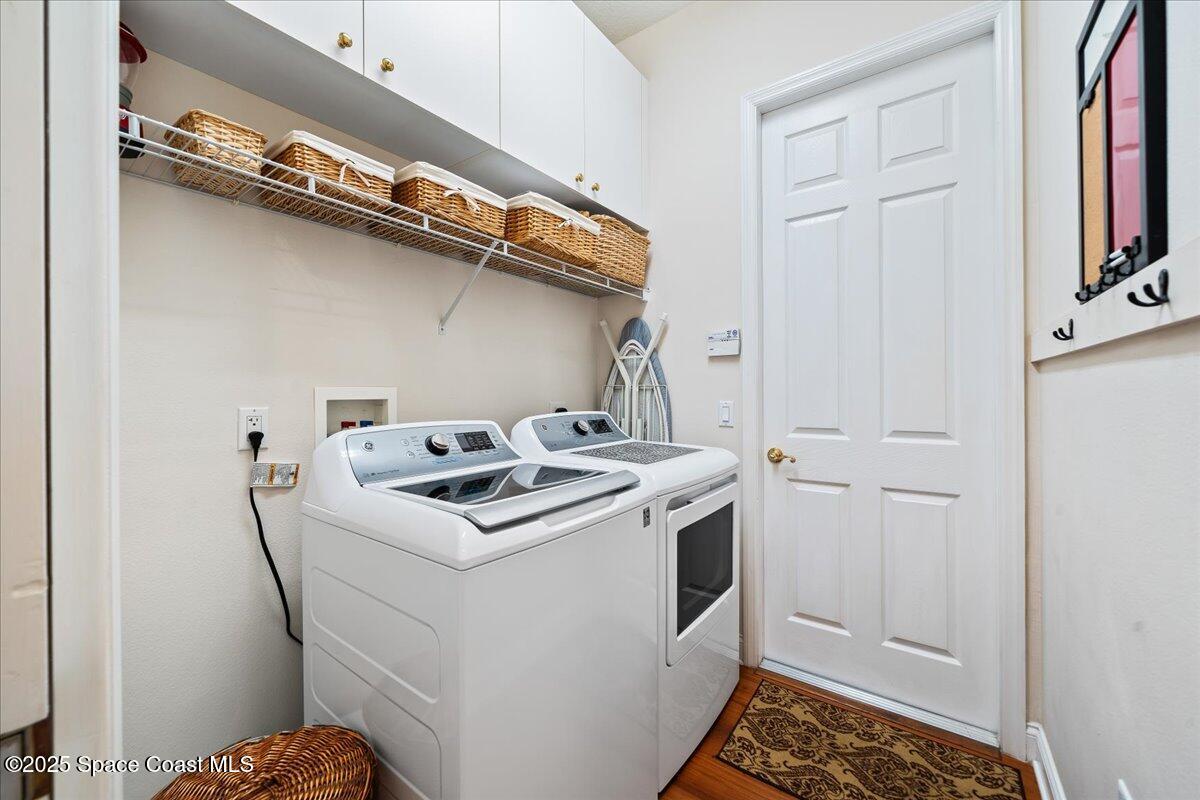 8167 Andover Way Melbourne, FL 32940 - Photo 42 of 78 a utility room with dryer and washer