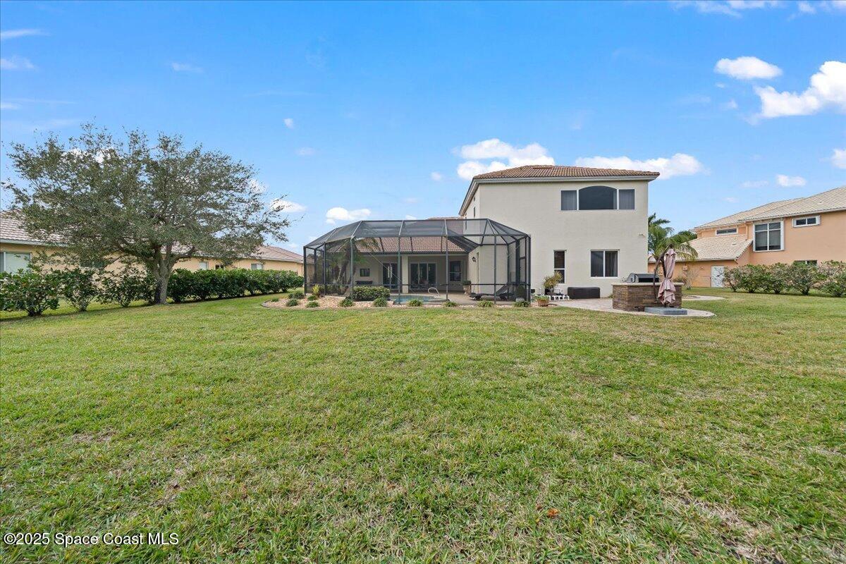 8167 Andover Way Melbourne, FL 32940 - Photo 53 of 78 a front view of house with yard