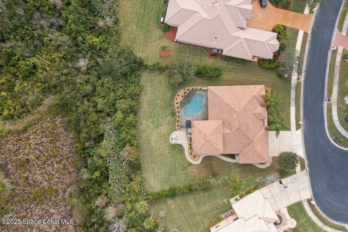 8167 Andover Way Melbourne, FL 32940 - Photo 60 of 78 an aerial view of a house with a yard basket ball court and outdoor seating
