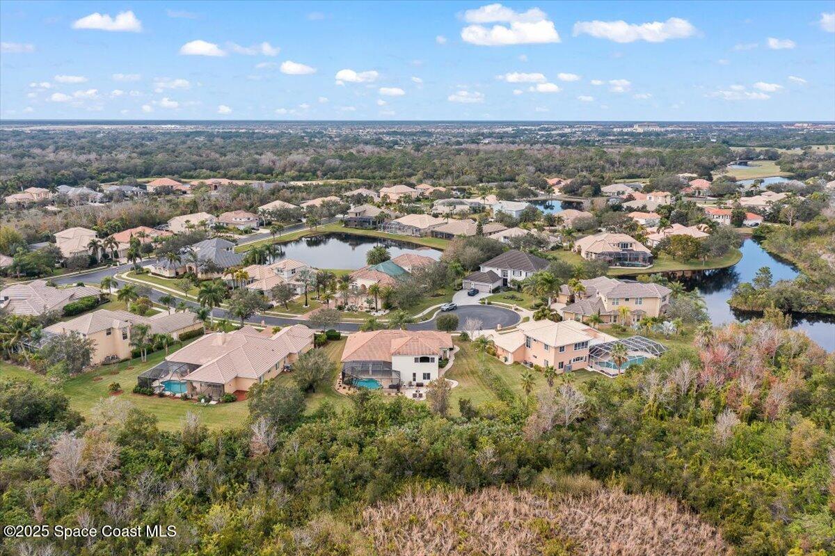 8167 Andover Way Melbourne, FL 32940 - Photo 65 of 78 an aerial view of residential houses with outdoor space