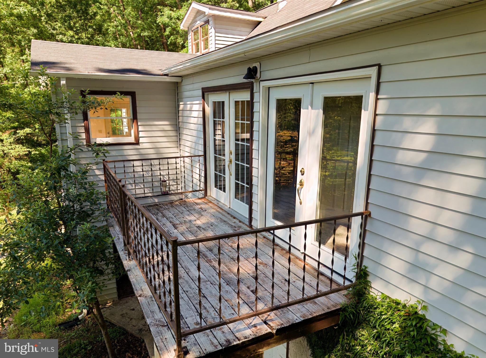 2932 Kerns School Road Springfield, WV 26763 - Photo 26 of 35 Charming balcony with serene views.