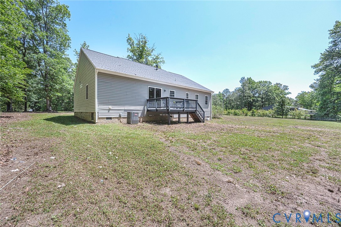 1297 Manfield Road Aylett, VA 23009 - Photo 38 of 41 a view of a house with a yard
