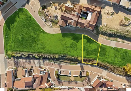 a view of a chairs and table in the patio