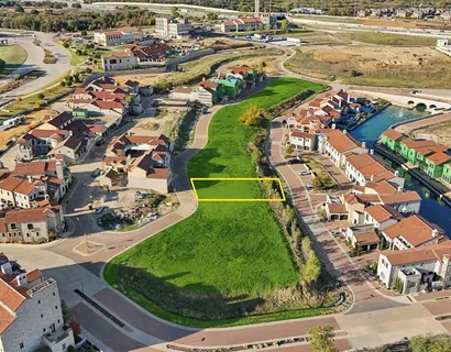 an aerial view of a house with a garden and plants