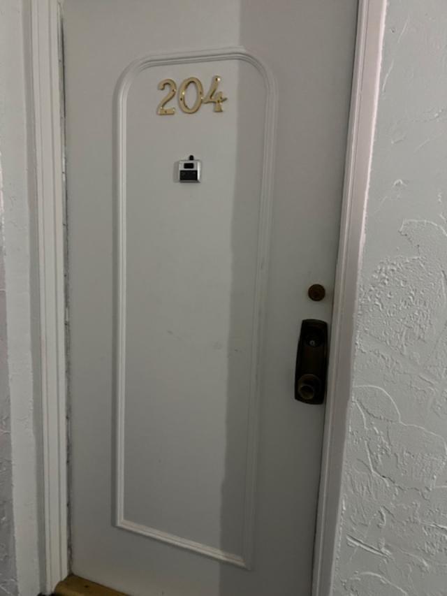 5681 Southwest 2nd Court, Unit 204 Margate, FL 33068 - Photo 3 of 22 a bathroom with a shower and a sink