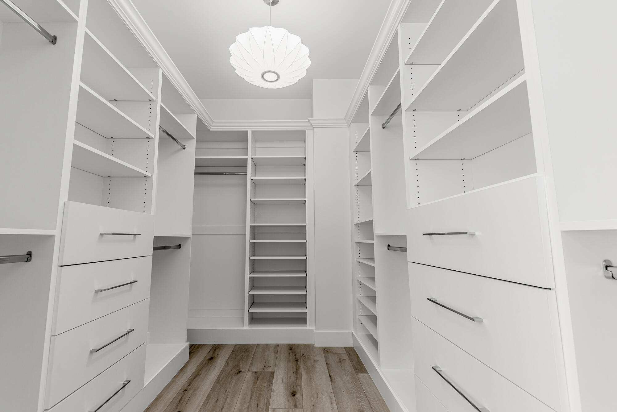 4692 Southeast Manatee Terrace Stuart, FL 34997 - Photo 18 of 47 a view of walk in closet with empty racks