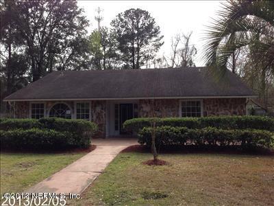 832 Worth Road Jacksonville, FL 32259 - Photo 1 of 27 a front view of a house with garden