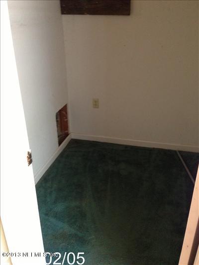 832 Worth Road Jacksonville, FL 32259 - Photo 15 of 27 a view of small space with wooden floor