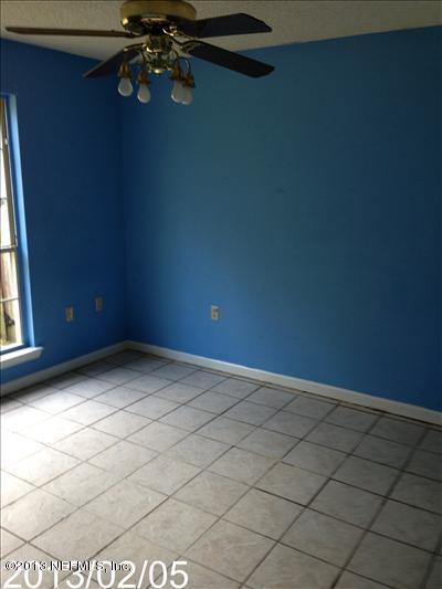 832 Worth Road Jacksonville, FL 32259 - Photo 23 of 27 a view of an empty room with a window
