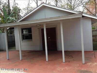 832 Worth Road Jacksonville, FL 32259 - Photo 27 of 27 a view of a wooden house with a door and a yard