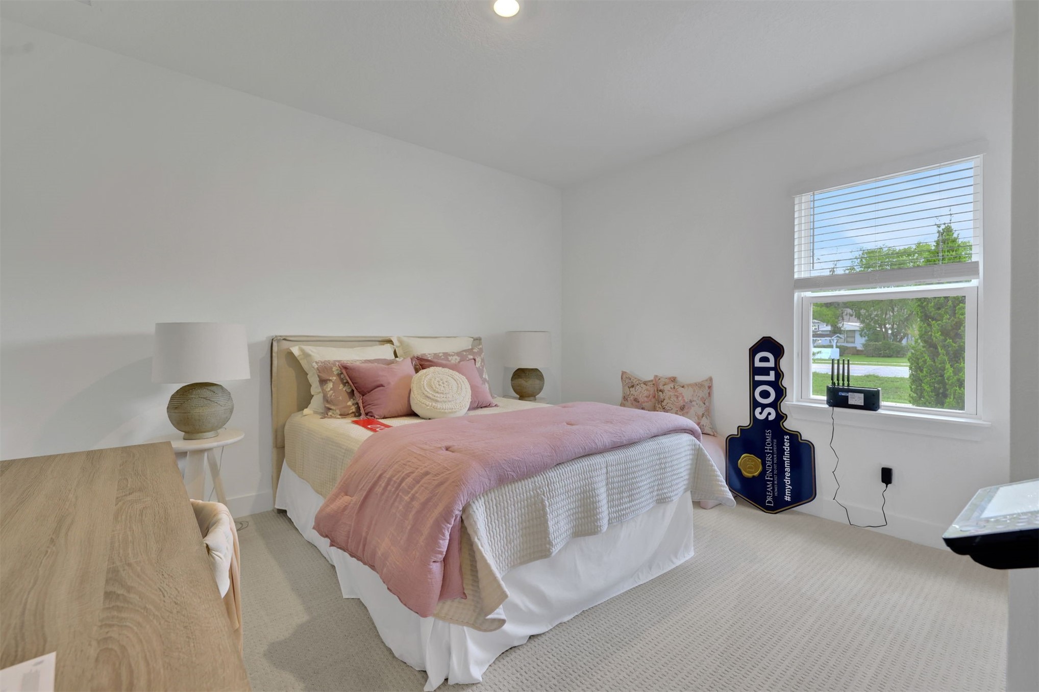 96040 Pirates Bluff Road Yulee, FL 32097 - Photo 11 of 38 a bedroom with a bed and a large window
