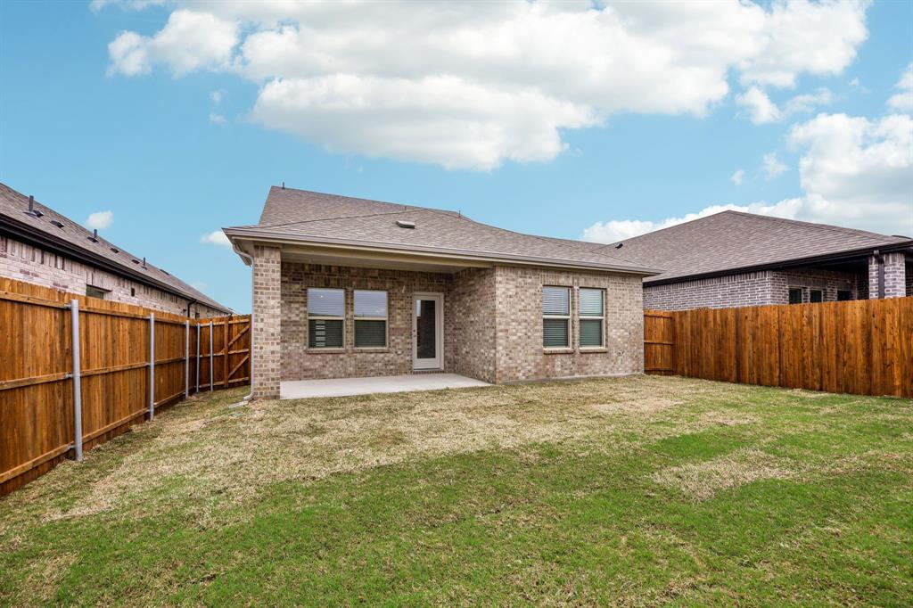 1721 Arches Road Anna, TX 75409 - Photo 37 of 39 a view of a house with backyard and porch