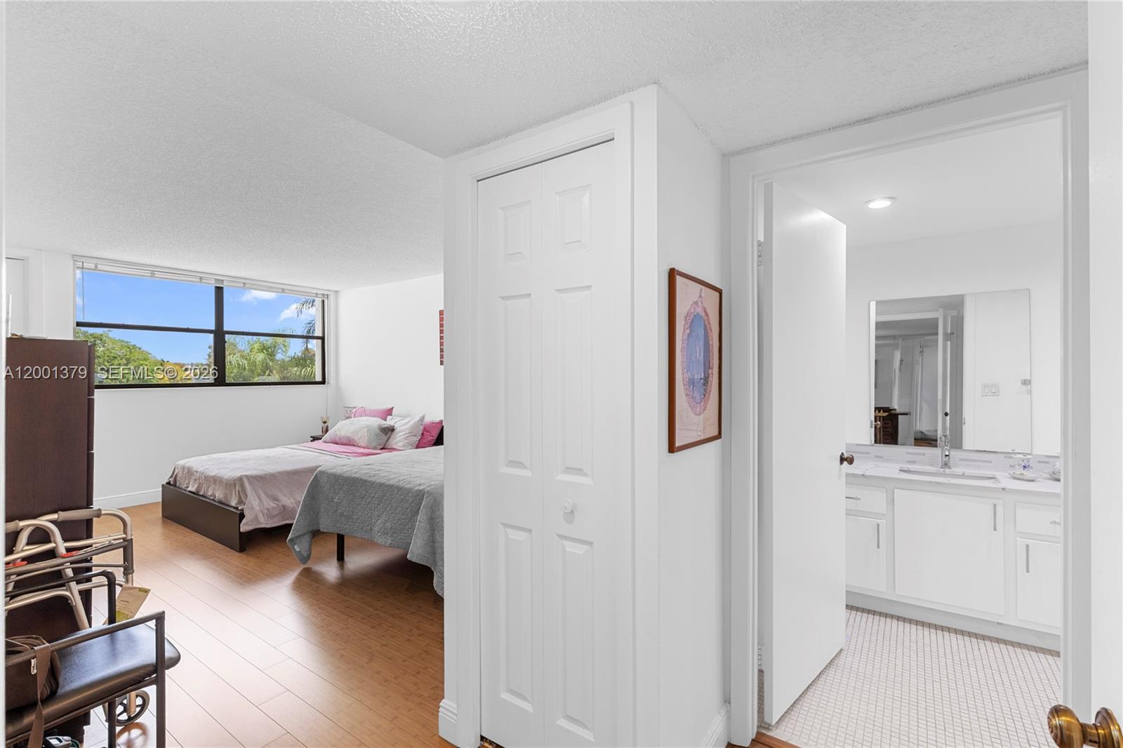 16251 Golf Club Road, Unit 311 Weston, FL 33326 - Photo 22 of 38 a room with furniture and a window