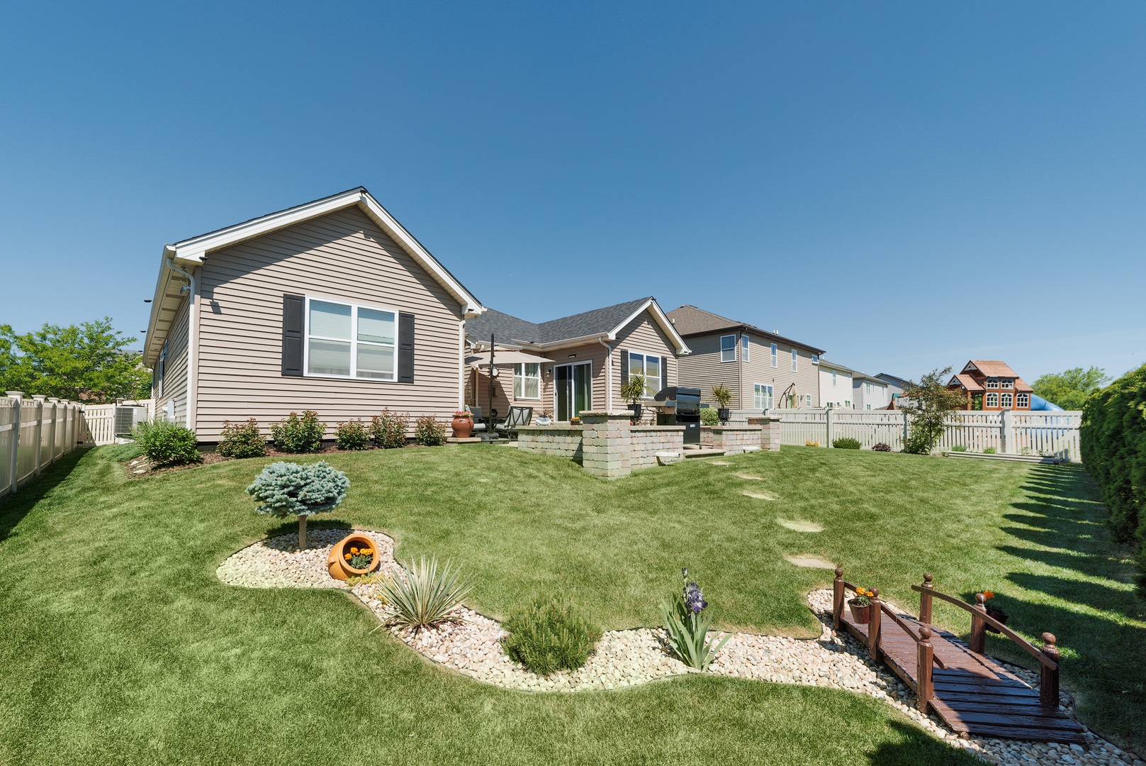 743 North Misty Ridge Drive Romeoville, IL 60446 - Photo 3 of 22 a front view of a house with garden
