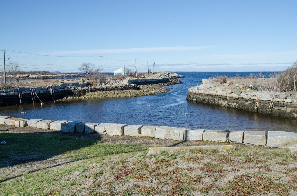 3 Colburn Street Gloucester, MA 01930 - Photo 3 of 17 a view of a water with lawn chairs