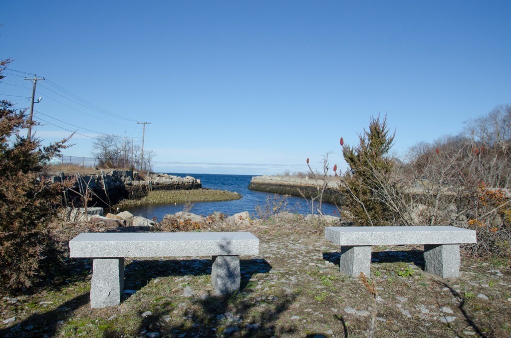 3 Colburn Street Gloucester, MA 01930 - Photo 7 of 17 a view of a lake with a house in the background
