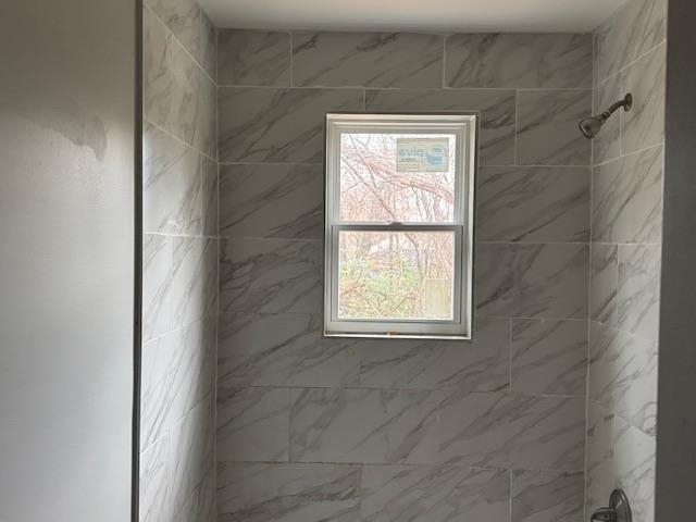 1627 Barton Street Memphis, TN 38106 - Photo 11 of 15 a bathroom with a window
