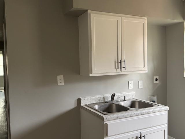 1627 Barton Street Memphis, TN 38106 - Photo 13 of 15 a kitchen with a sink and cabinets