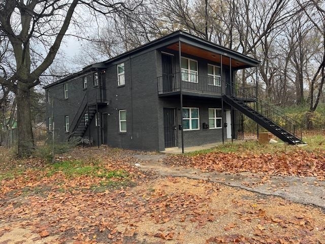 1627 Barton Street Memphis, TN 38106 - Photo 15 of 15 a front view of a house with a yard