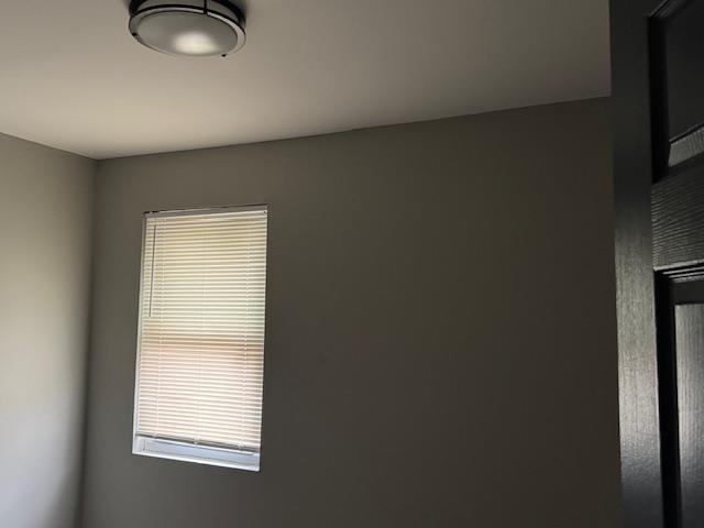 1627 Barton Street Memphis, TN 38106 - Photo 10 of 15 a view of an empty room with a window