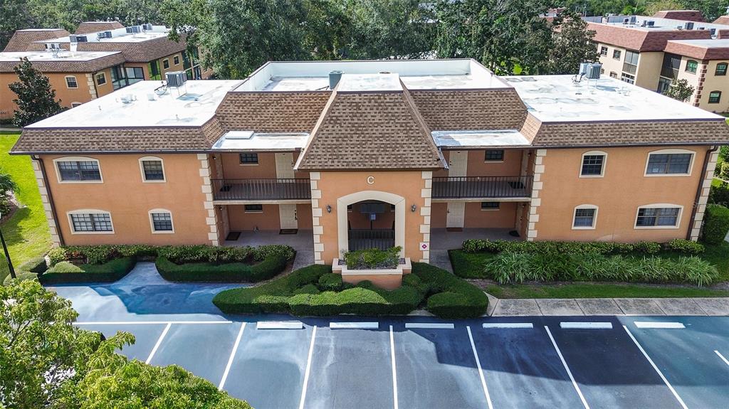 12900 Vonn Road, Unit C202 Largo, FL 33774 - Photo 30 of 38 a aerial view of a house yard and a patio