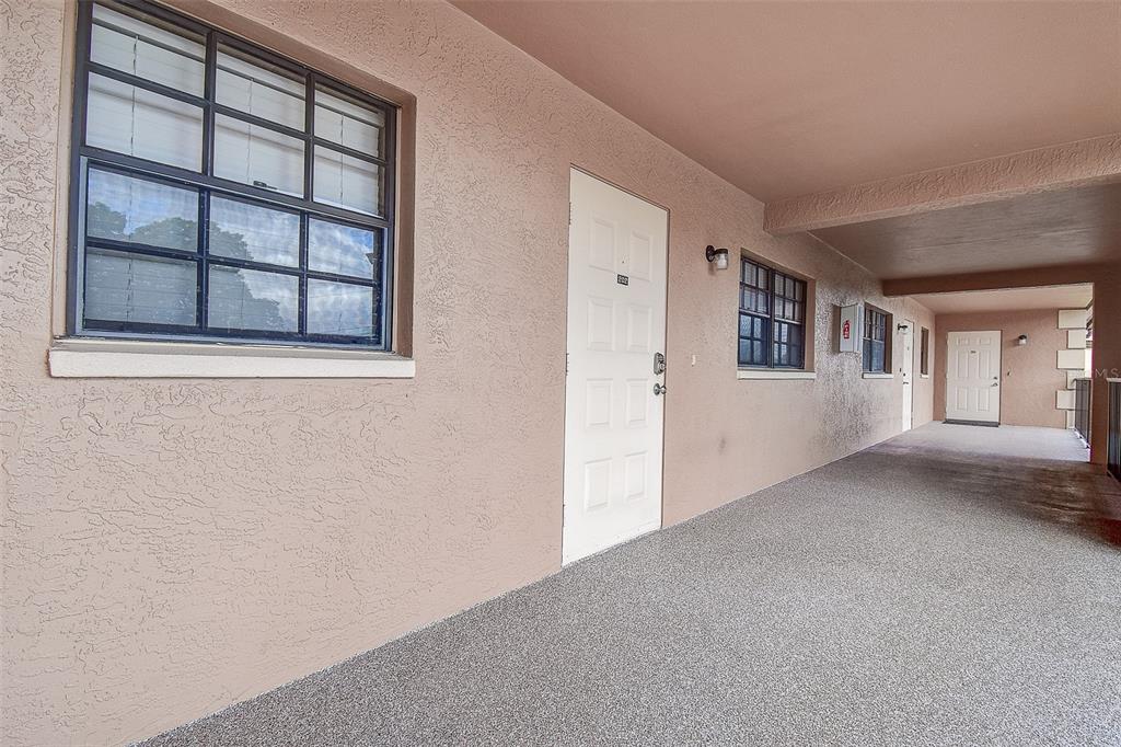 12900 Vonn Road, Unit C202 Largo, FL 33774 - Photo 3 of 38 an empty room with windows