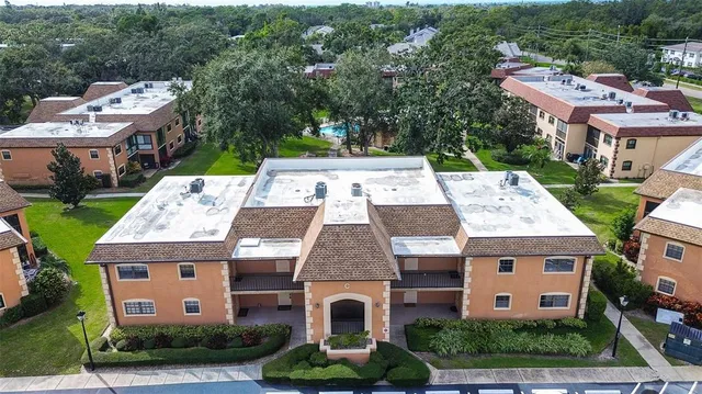 a backyard of a house with seating space
