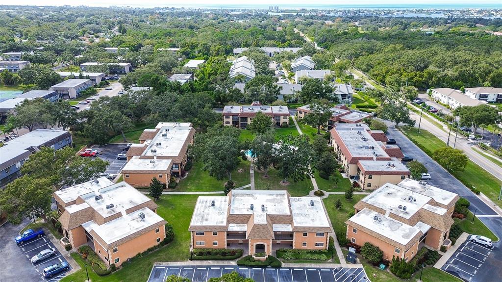 12900 Vonn Road, Unit C202 Largo, FL 33774 - Photo 33 of 38 an aerial view of residential houses with outdoor space