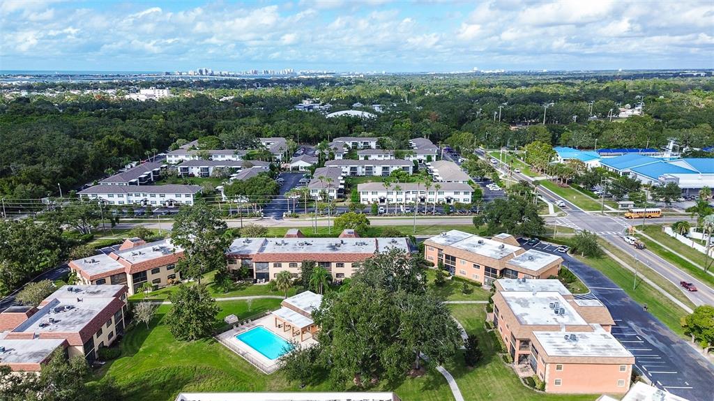 12900 Vonn Road, Unit C202 Largo, FL 33774 - Photo 35 of 38 an aerial view of residential houses with outdoor space