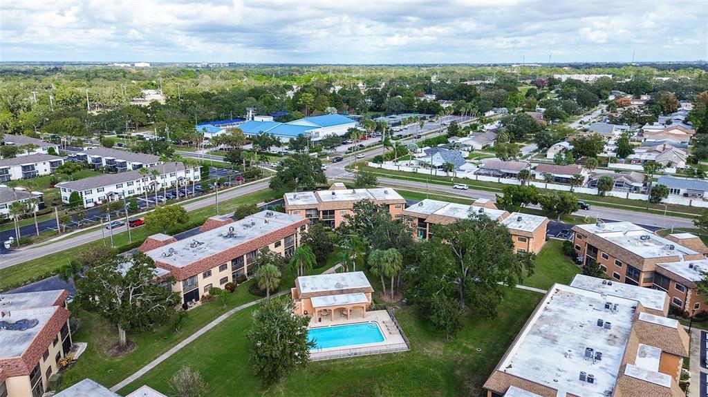 12900 Vonn Road, Unit C202 Largo, FL 33774 - Photo 36 of 38 an aerial view of residential building and lake