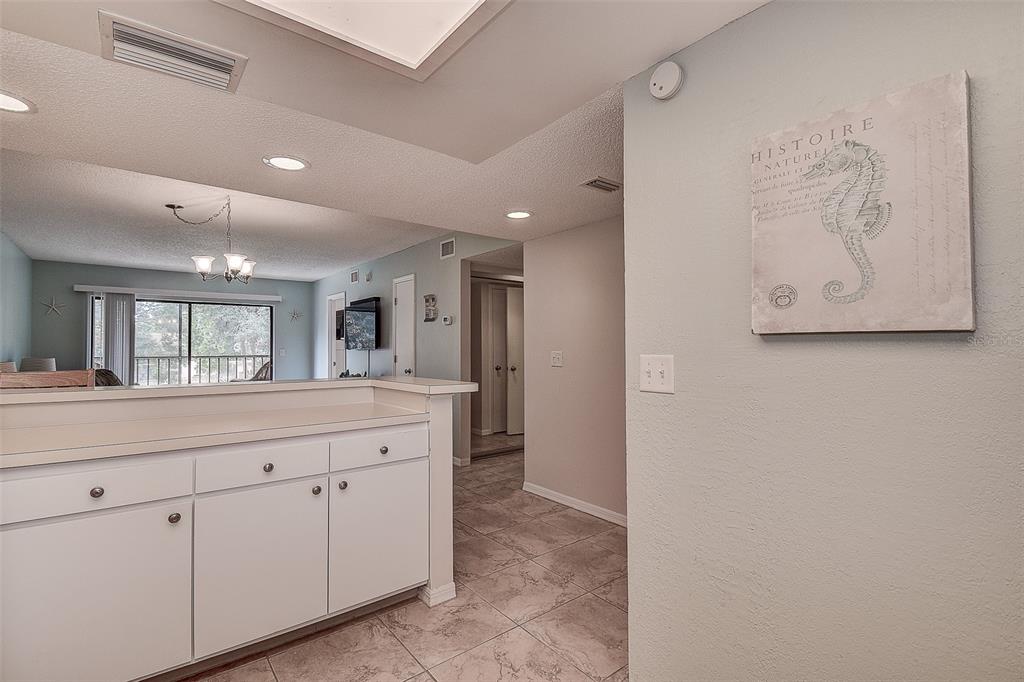 12900 Vonn Road, Unit C202 Largo, FL 33774 - Photo 8 of 38 a bathroom with a sink and a mirror