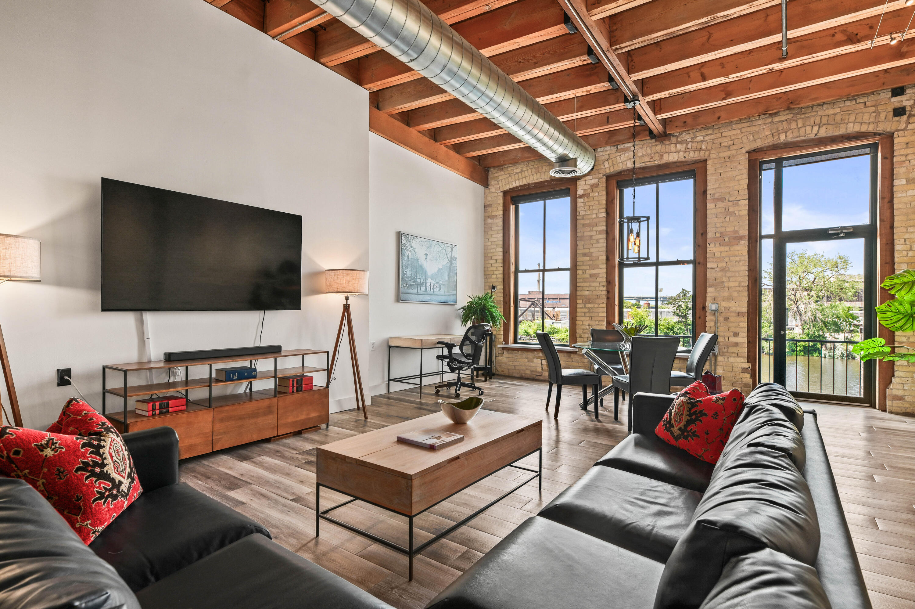 205 North Water Street, Unit 200 Milwaukee, WI 53202 - Photo 4 of 24 Living Room with River Views