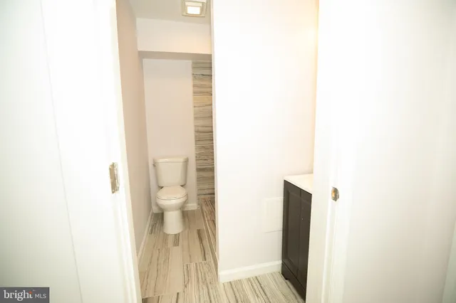 a bathroom with a toilet