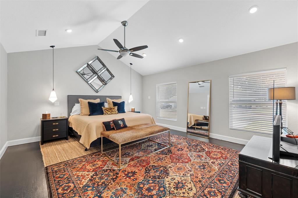 4229 Fort Avenue Waco, TX 76710 - Photo 14 of 40 a bedroom with a bed and wooden floor