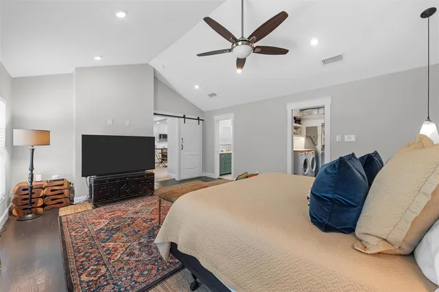 a bathroom with a double vanity sink mirror and shower
