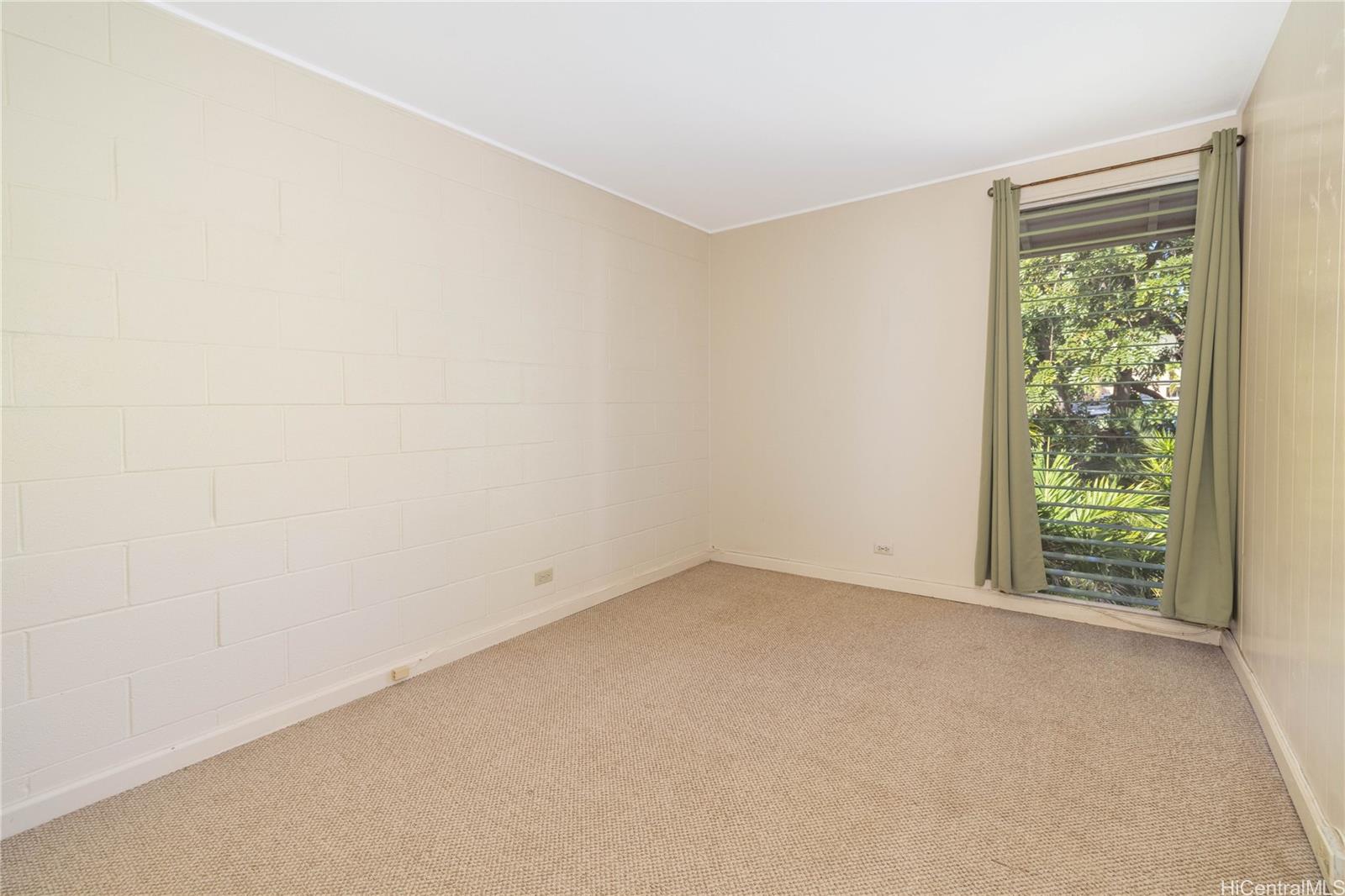 92-739 Makakilo Drive, Unit 21 Kapolei, HI 96707 - Photo 16 of 25 an empty room with a window