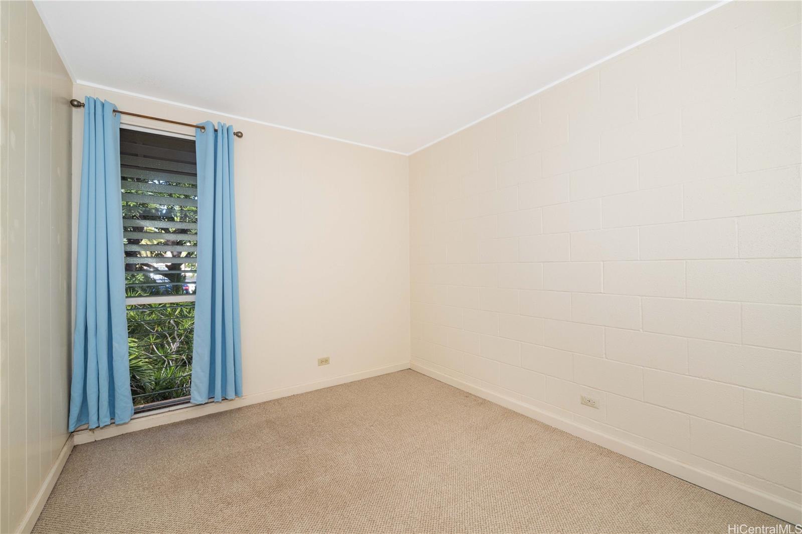 92-739 Makakilo Drive, Unit 21 Kapolei, HI 96707 - Photo 18 of 25 an empty room with windows