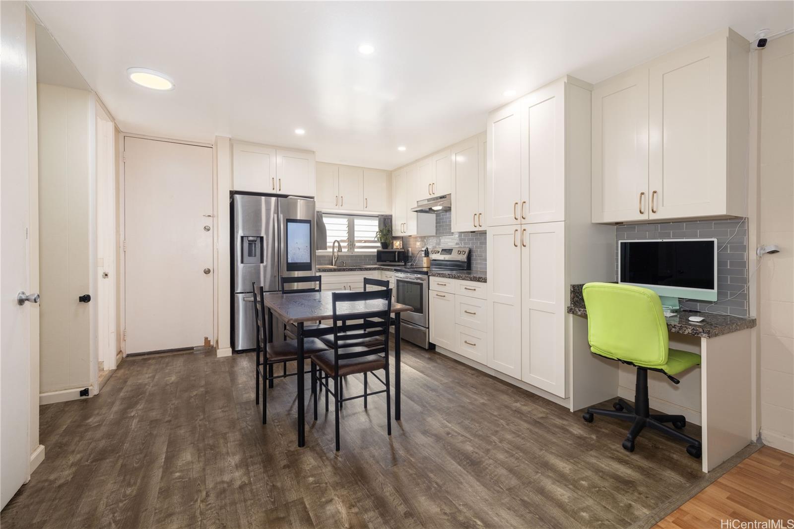 92-739 Makakilo Drive, Unit 21 Kapolei, HI 96707 - Photo 2 of 25 a view of kitchen with furniture and a refrigerator
