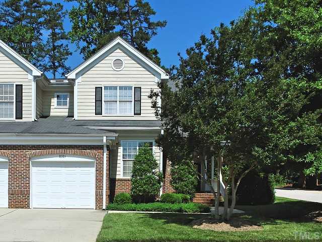 End unit townhome with oversize single garage.
