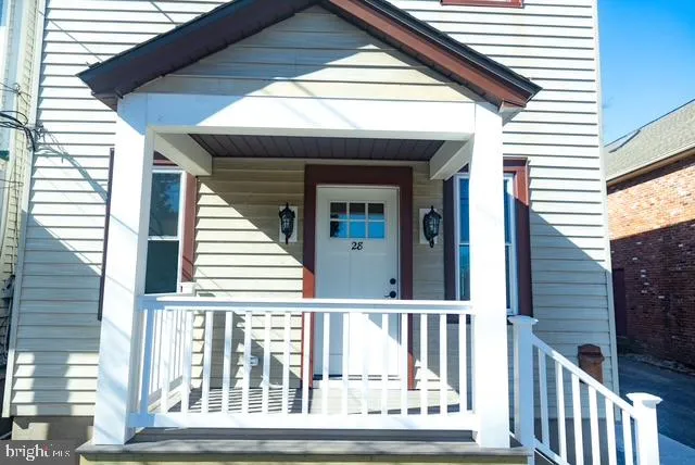 a view of a porch with a small cabin