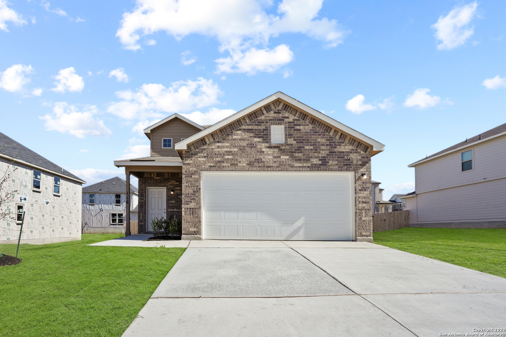 a front view of house with yard