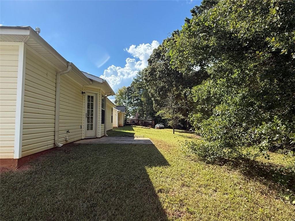 32 Chelsea Lane Grantville, GA 30220 - Photo 15 of 16 a view of a back yard of the house