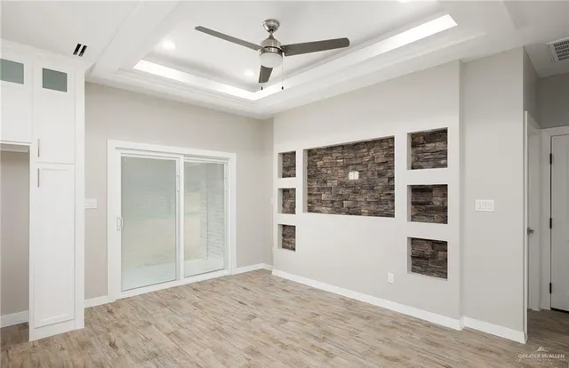 a view of an empty room with window