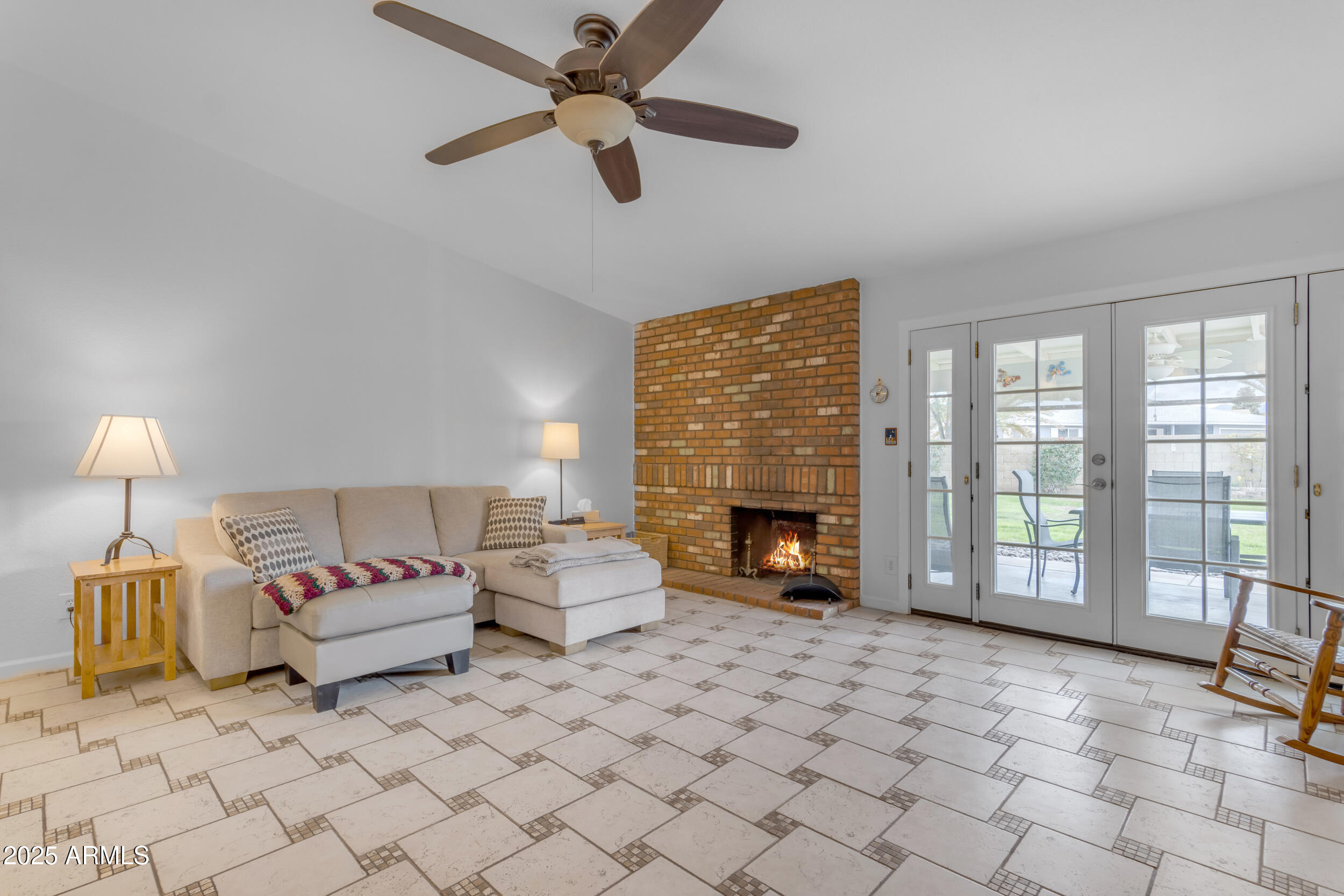 5165 East Tunder Drive Phoenix, AZ 85044 - Photo 12 of 44 a living room with furniture and a fireplace