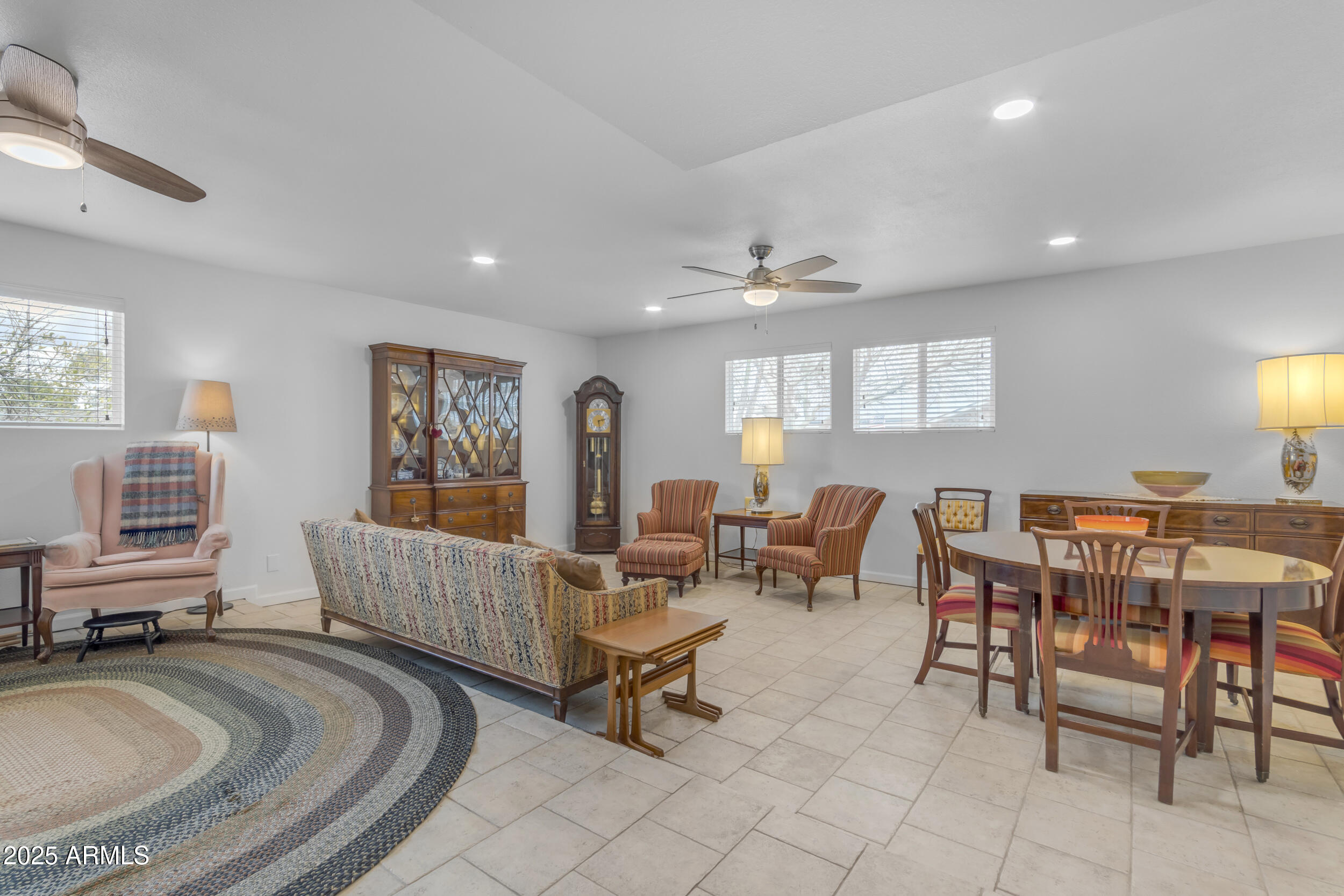 5165 East Tunder Drive Phoenix, AZ 85044 - Photo 16 of 44 a living room with furniture and a wooden floor