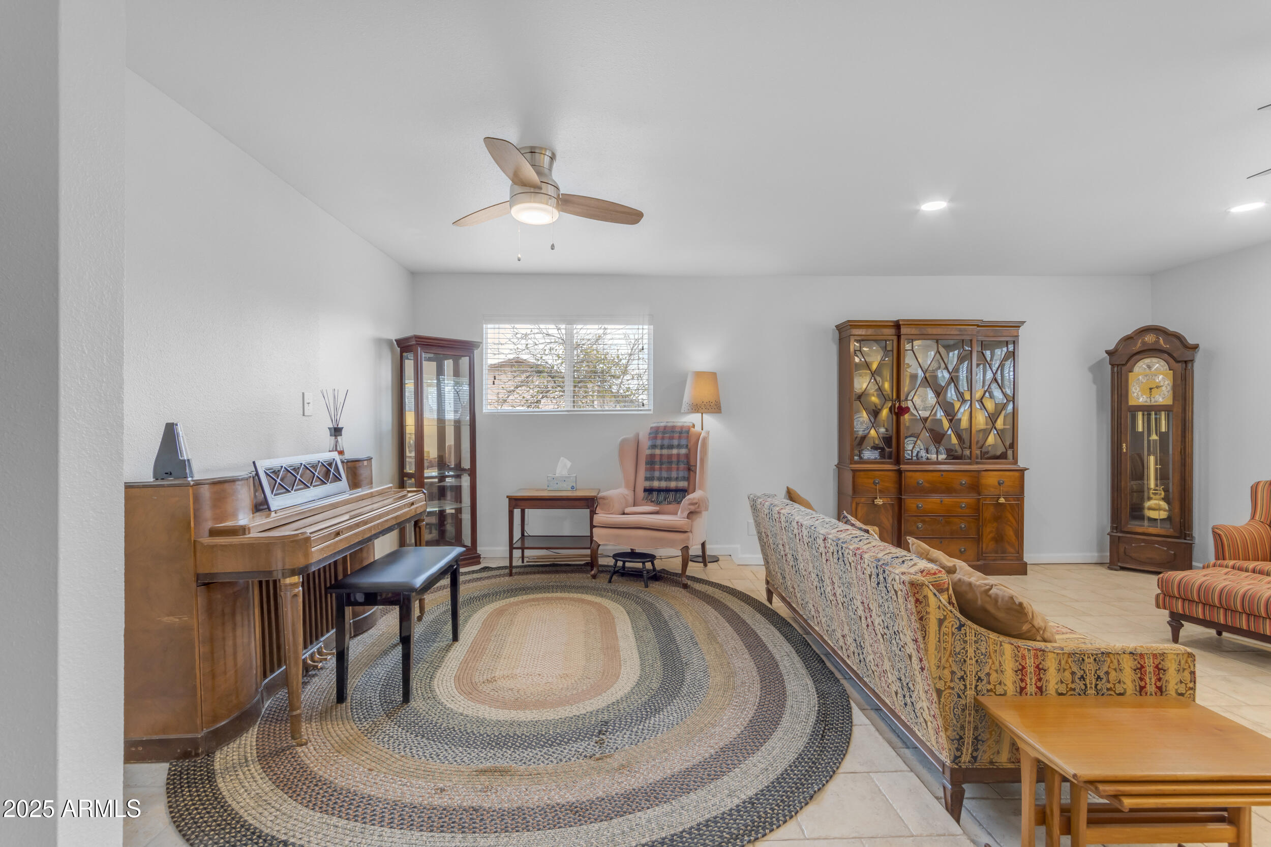5165 East Tunder Drive Phoenix, AZ 85044 - Photo 17 of 44 a living room with furniture and a wooden floor