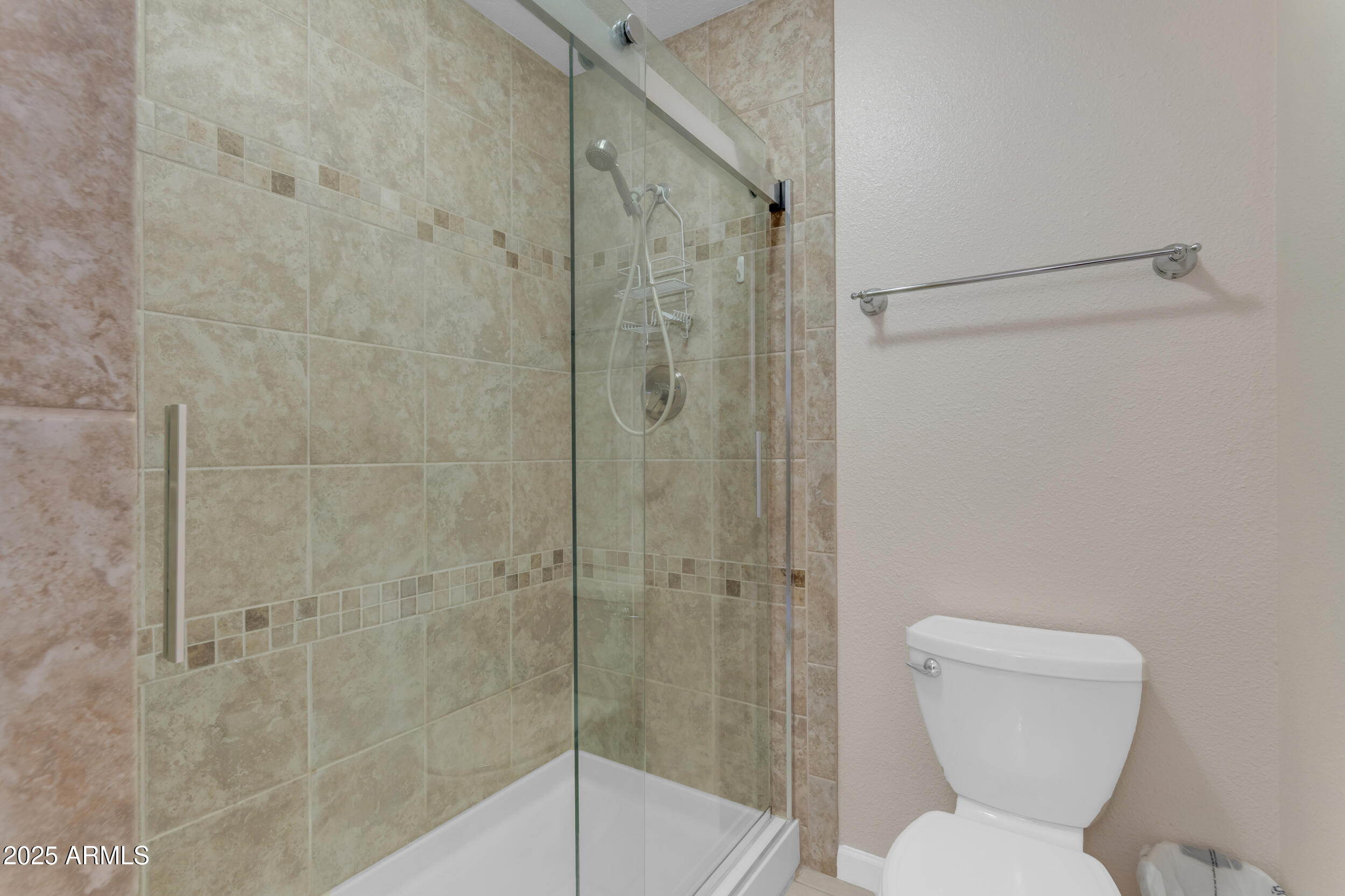 5165 East Tunder Drive Phoenix, AZ 85044 - Photo 29 of 44 a bathroom with a toilet and shower