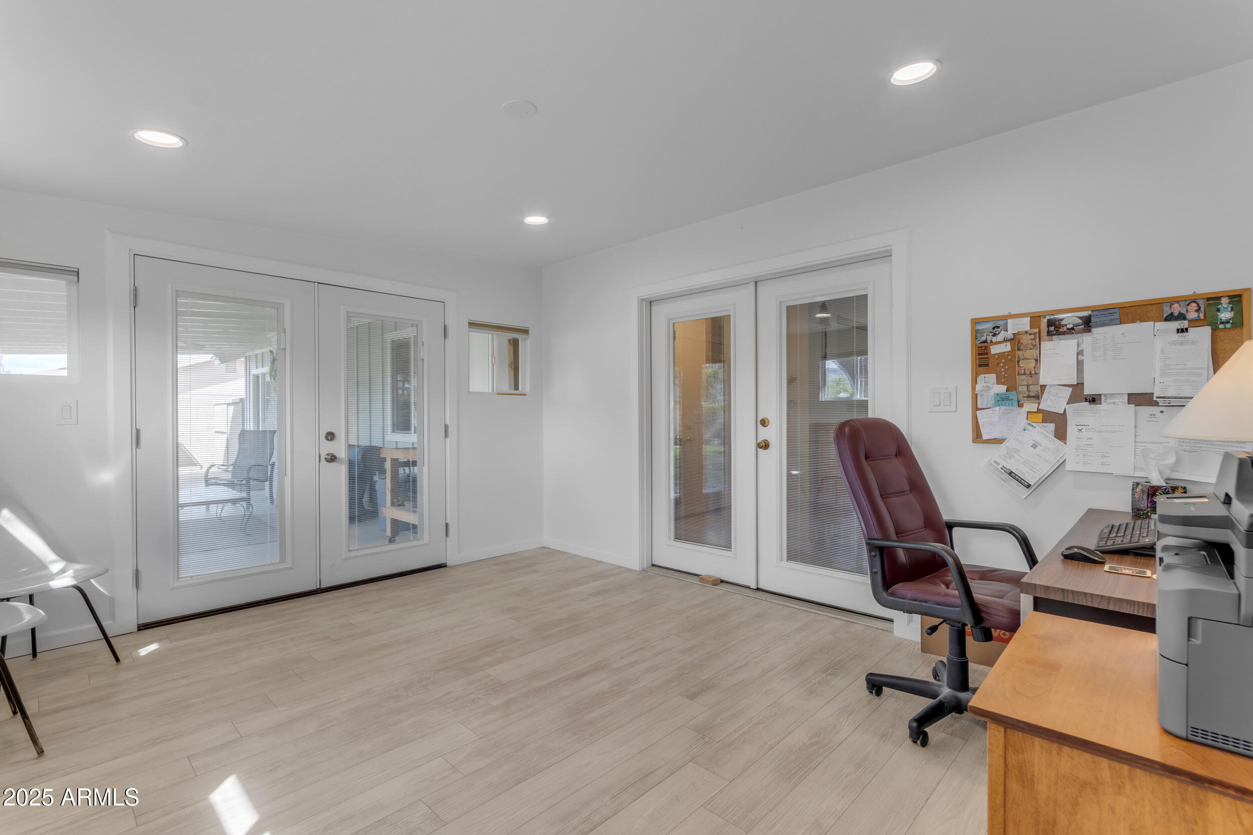 5165 East Tunder Drive Phoenix, AZ 85044 - Photo 31 of 44 a view of a workspace with furniture and a window