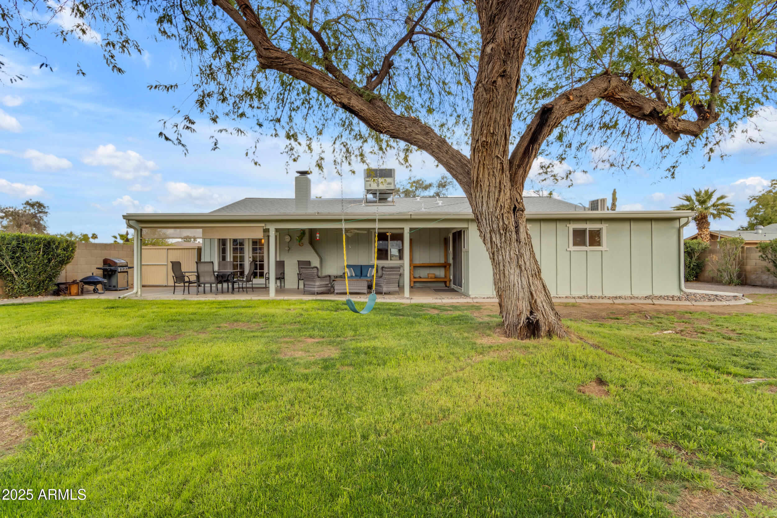 5165 East Tunder Drive Phoenix, AZ 85044 - Photo 41 of 44 a view of a house with a backyard